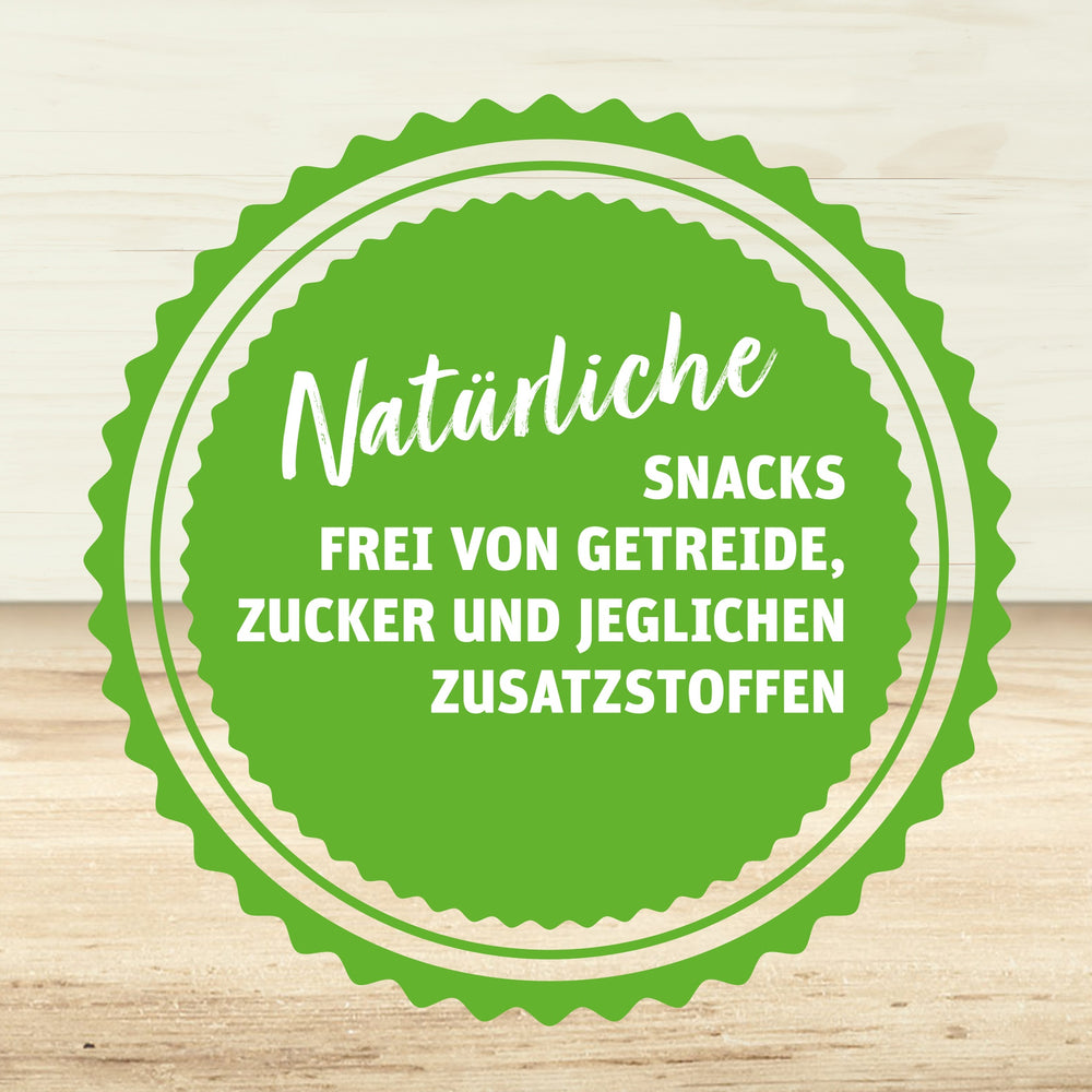 Sprechblase mit Text "Natürliche SNACKS FREI VON GETREIDE, ZUCKER UND JEGLICHEN ZUSATZSTOFFEN".